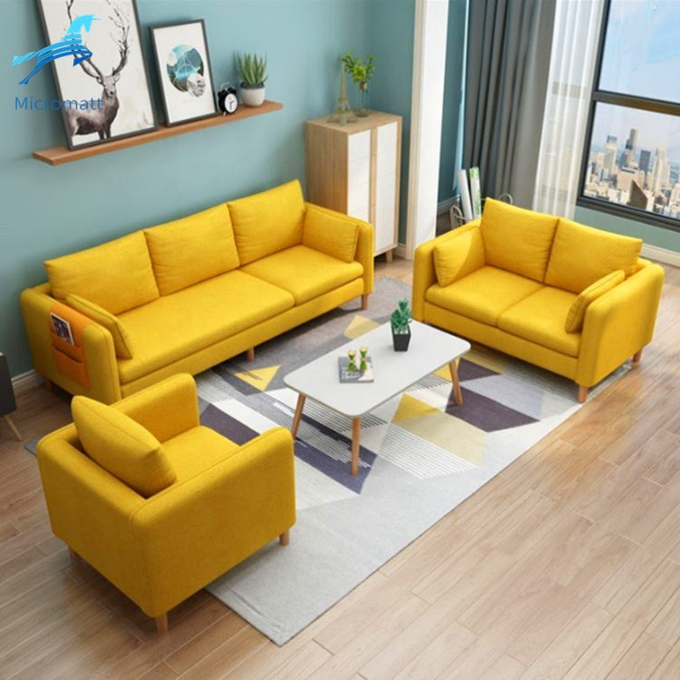 Yellow sofa set with coffee table in living room